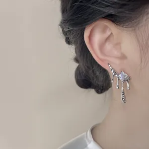 Chic liquid metal lava rhinestone earrings for women, unique asymmetric drop design jewelry.