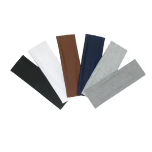 Close-up detail of multi-color solid sports headbands set, stretchy and sweat-absorbent fabric.