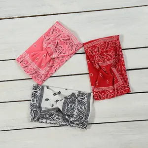 Paisley print elastic cross headband, wide boho hair band for women sports and daily wear.