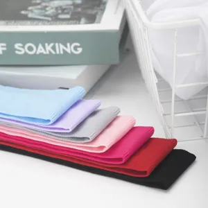 Detailed close-up shot of colorful yoga sports headbands, sweat-absorbing nylon hair bands.