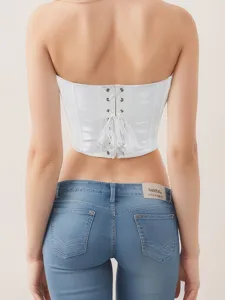 Back detail of white satin strapless corset top featuring adjustable lace-up design.
