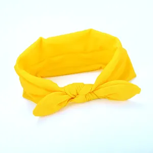 Bright yellow fabric bow headband for women and girls, soft daily hair accessory fashion hoop.