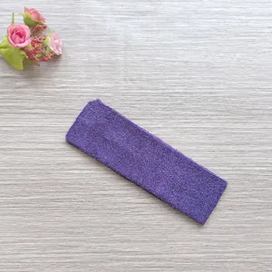 Purple terry cloth sport headband detail, soft sweat-absorbing workout hair band for yoga.