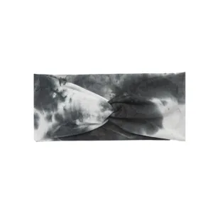 Primo piano della fascia elastica intrecciata con stampa tie-dye in bianco e nero.