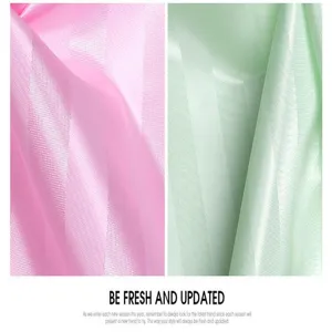 Thickened polyester striped fabric detail in pink and light green, soft texture and elegant sheen.