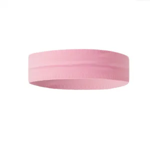 Pink athletic headband for women, high elastic sweat-absorbing yoga hair band fitness.