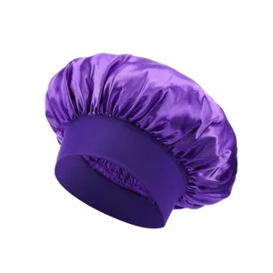 Purple satin sleep cap detail featuring smooth fabric and wide elastic band for hair protection.