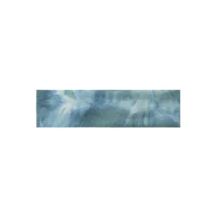 Close-up detail of blue tie-dye stretch sport headband, showing soft elastic fabric texture.