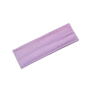 Purple athletic headband detail view, soft elastic fabric close-up shot for fitness yoga.