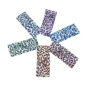Leopard print cross knotted headband set, stylish elastic hair wrap for women sports and daily wear.