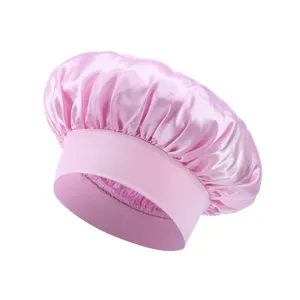 Pink satin sleep bonnet for curly hair care, wide band soft night cap for women daily use.