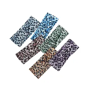 Leopard print knotted headband detail, cross yoga hair band for women, fashion hair accessory.