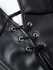 Black faux leather corset top with lace up design and metal eyelets for women waist training detail