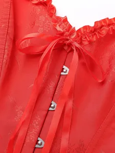 Rotes Jacquard Korsett Oberteil Detailansicht mit Rüschen, Schleife und Metallverschluss.