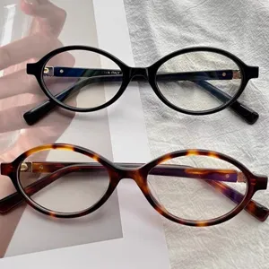 Retro oval anti-blue light glasses for women and men, stylish small frame geek eyewear.