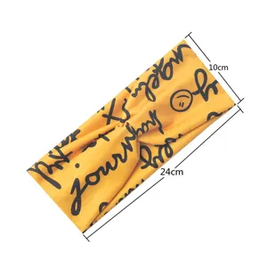 Gelbes Baumwoll Sport Stirnband mit Buchstaben Druck und Twist Design, atmungsaktives Yoga Band.