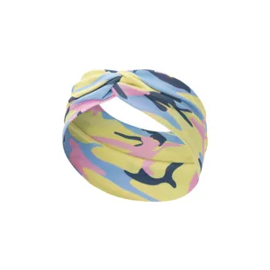 Detailed view of the sports yoga headband with colorful camouflage print, stretchy fabric.