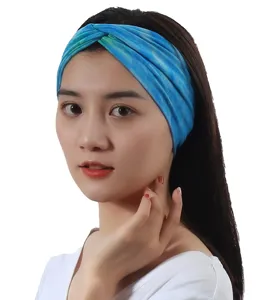 Close-up detail of blue tie-dye sports yoga headband worn by model, elastic hair accessory.