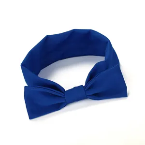 Blauwe stof haarlint strik hoofdband voor schattige kleine meisjes detail foto