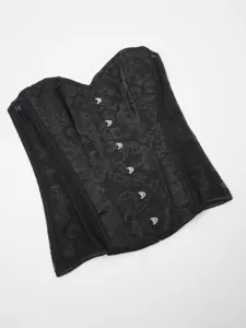 Detailed view of the black jacquard lace corset top, featuring front metal busk closures.