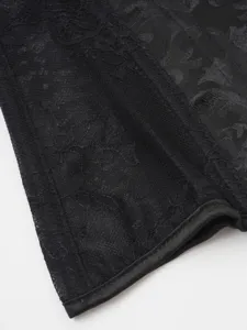 Lace jacquard corset top detail shot showcasing intricate fabric texture and bustier design.