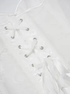 White lace up corset top detail, floral jacquard fabric and metal eyelets for fashion.