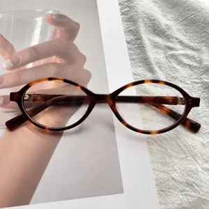 Vintage tortoiseshell oval optical glasses with blue light blocking lenses for daily stylish wear.