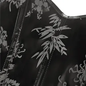 Black PU leather corset top detail view, vintage floral print and boning seam close-up.