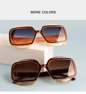 Detailed view of trendy oversized polygon gradient sunglasses with stylish contrast color frames.