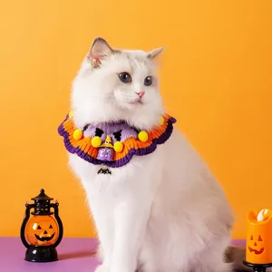 Cute Halloween cat knitted collar with pumpkin and ghost charms, perfect pet bib detail.
