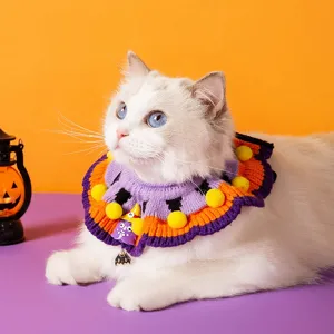 Halloween knitted pet collar with pumpkins and pom-poms for cute cats and dogs decoration.
