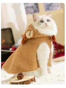 Close-up detail shot of a cute cat pet reindeer cape costume in cozy winter fleece.