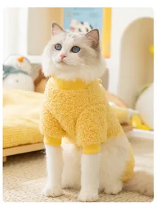 Detailed view of a warm yellow plush pet apparel designed for cold weather and cozy days.