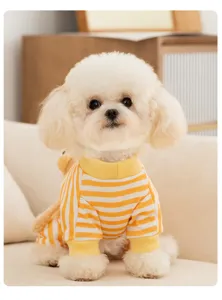 Cute striped pet dog clothes detail showing soft yellow and white fabric and 3D bear plush.