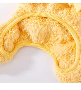 Detail view of warm yellow fleece pet sweater with soft texture for cats and small dogs.