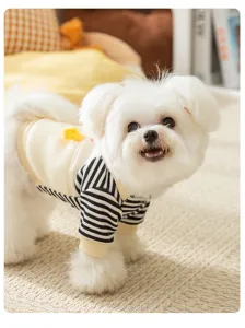 Cute pet sweatshirt detail featuring black-white stripes, soft fleece, and cozy indoor pet shot.