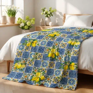 Cozy flannel throw blanket featuring a vibrant blue tile and fresh lemon pattern for home.