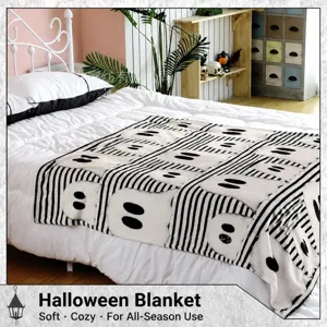 Cute ghost flannel blanket with black and white stripes for Halloween cozy home bedroom use.