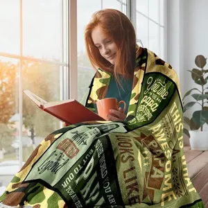 Cozy flannel blanket featuring custom Father's Day print, perfect for warm home relaxation.