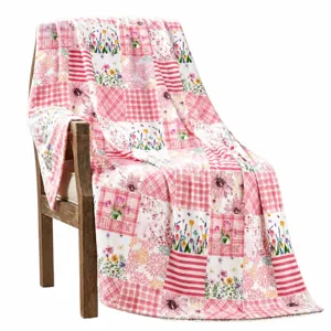 Spring summer pink floral patchwork flannel blanket, soft plush comfort for sofa bed rest.