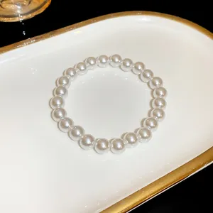 Elegant imitation pearl bracelet, French chic design for women, stylish jewelry accessory.