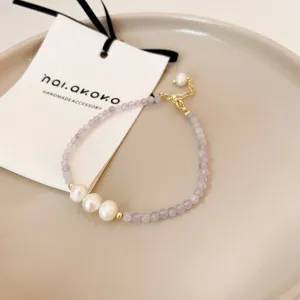 French light luxury purple bead baroque pearl bracelet with gold accessories and handmade brand tag.