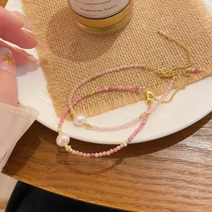 Sweet pink crystal freshwater pearl beaded bracelet with delicate gold adjustable chain style.