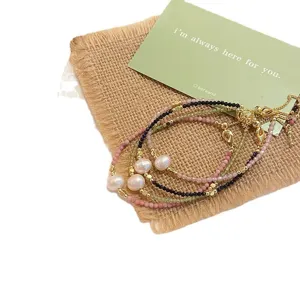 Freshwater pearl beaded crystal bracelet, sweet multi-layer stacked style for daily elegant wear.