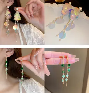 Elegant long tassel earrings featuring iridescent sequins, pearls, and crystal charms for women.