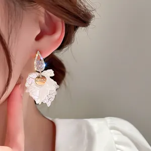 Exquisite teardrop zircon and white leaf petal earrings with a chic gold letter round pendant.