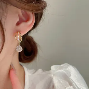 Gold geometric zircon dangling earrings, elegant and stylish ear studs for daily wear.