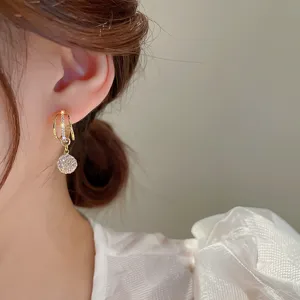 Gold multi-layer zircon hoop earrings with crystal ball pendant for women fashion jewelry detail.