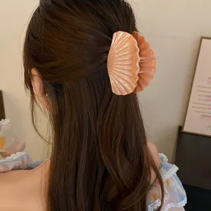 Acrylic seashell hair claw clip for women, sweet and elegant shark clip hair accessory.