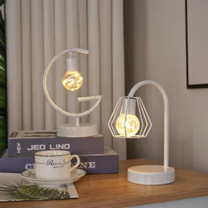 Detail shot of Nordic style iron art LED decorative night light with warm lighting effect.